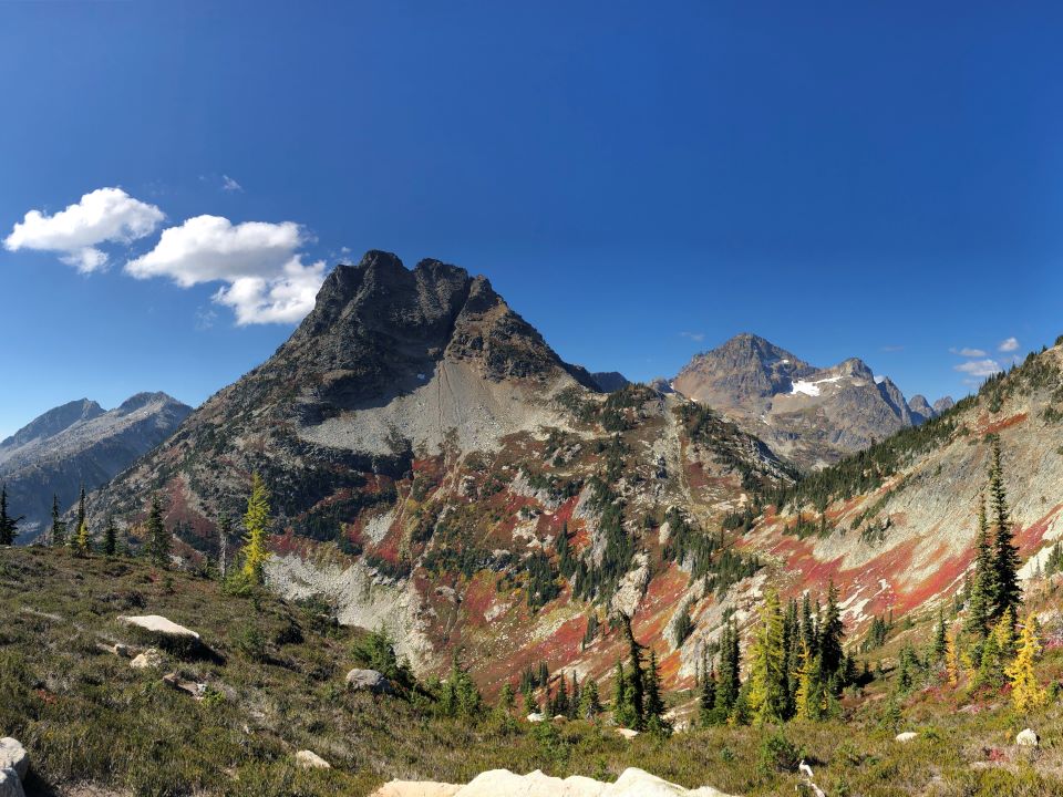 fire-colored foliage covers some the Cascade mountains. North Cascade National Park, WA