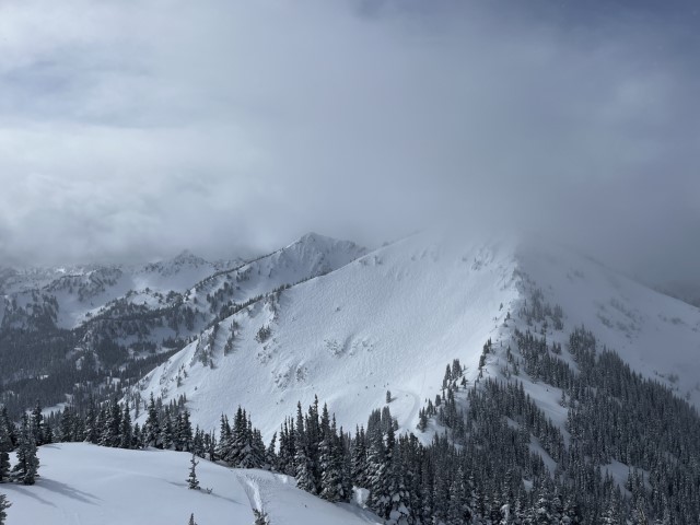 Low clouds cover the peak of Powder bowl. Crystal Mountain, WA